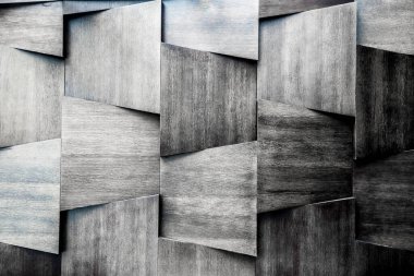 Ahşap duvar bir sürü ahşap fayansla birleşir. Ahşap doku arka planı. Siyah beyaz fotoğraf