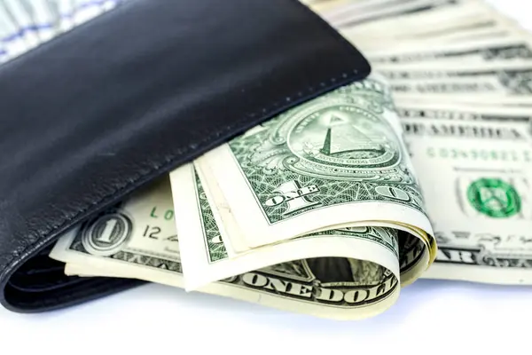 Black leather wallet with money on a white background