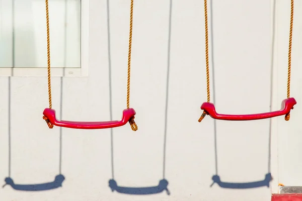 Set Red Swings Modern Kids Playground — Stock Photo, Image