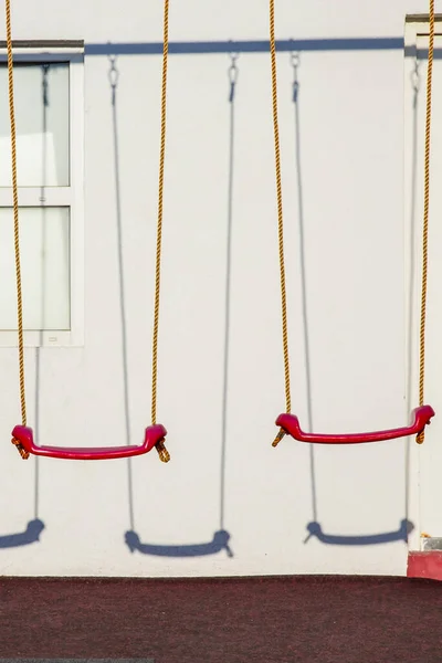 Set Red Swings Modern Kids Playground — Stock Photo, Image