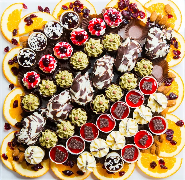 Assorted fruit and chocolate cakes for holiday