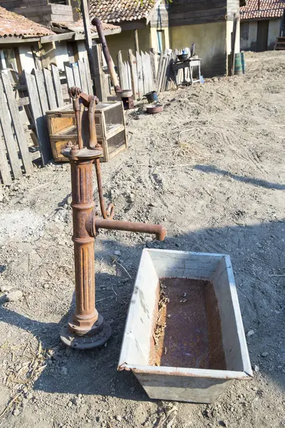 old hand pump for water extraction