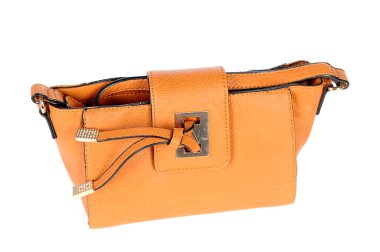 Beyaz arka planda turuncu kadın çantası.