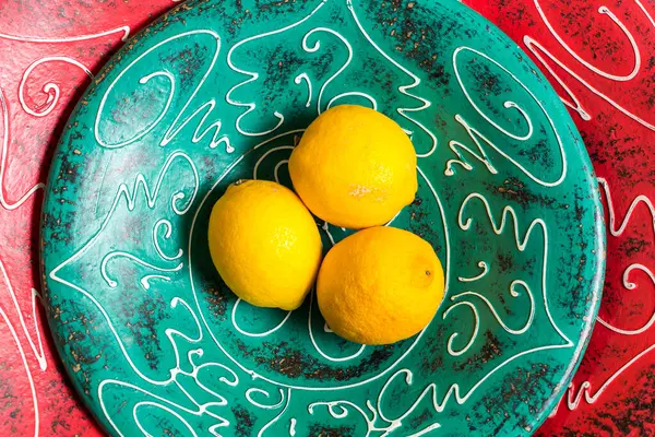 Lemons. Fresh lemons in rustic ceramic bowl