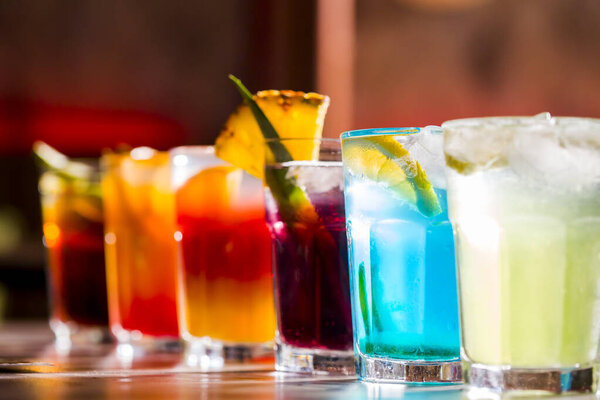 Colorful cocktail drinks in bar