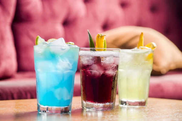Set of colorful cocktails in bar