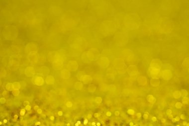 Noel altın arka plan. Tatil parlak zemin. Ufuk yıldız yanıp sönen ile arka plan. Bulanık Bokeh