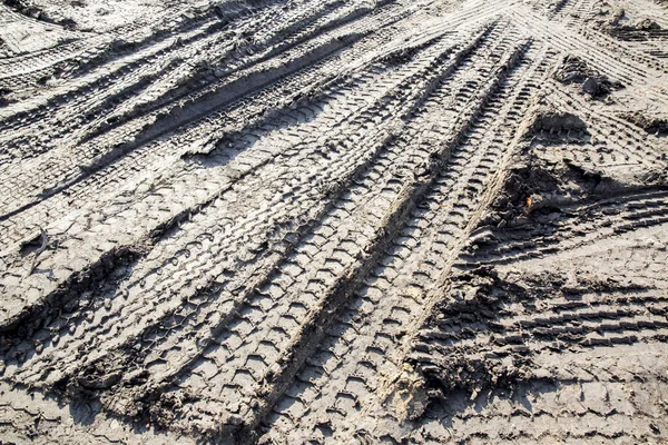 Texture of wheel track on the mud