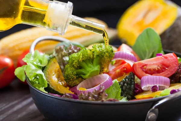 stock image Olive oil and  fresh vegetable salad