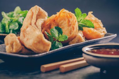 Chinese cuisine on wooden background.