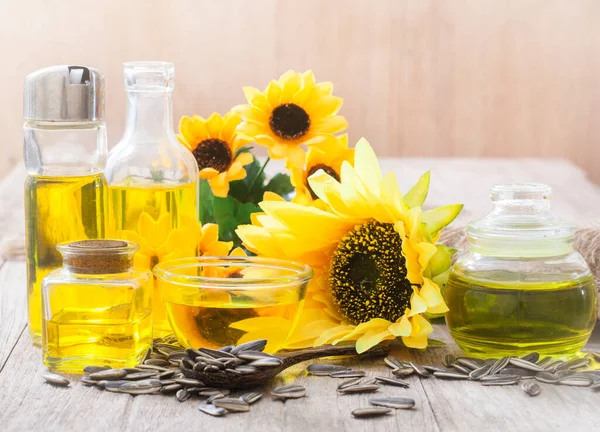 Sunflower oil in bottle glass with seed