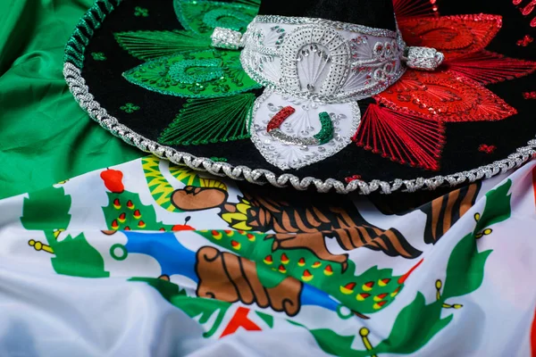Tricolor mariachi hat on the Mexican flag. Mexican background.