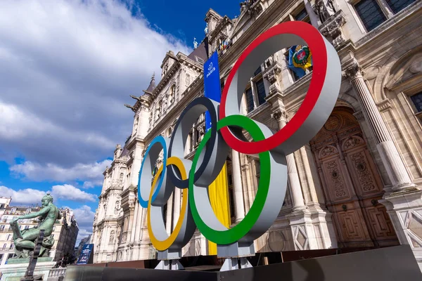 Paris, France - February 26, 2023: Olympic rings in front of the facade of the town hall of Paris, France, the city hosting and organizing the sports competitions of the summer olympic games in 2024