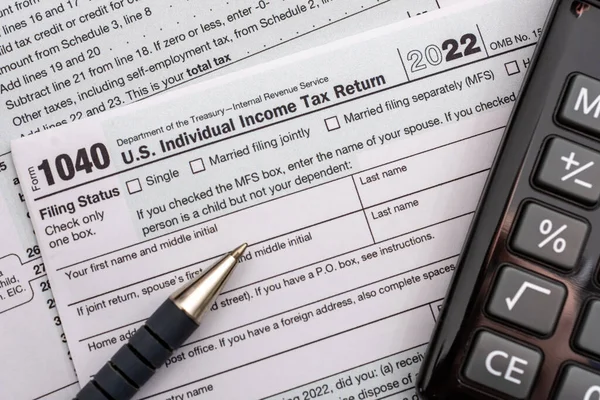 US individual Income tax return document. People have to complete the form 1040 every year to declare their income from the previous year to the Internal Revenue Service of the Department of Treasury