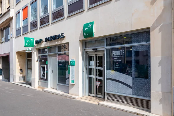 stock image Paris, France - March 29, 2023: Exterior view of a bank branch of BNP Paribas, the French commercial bank among the largest in the world