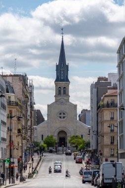 Paris, France - July 19, 2023: Distant view of Notre-Dame de la Gare catholic church located place Jeanne d'Arc, in the 13th arrondissement of Paris, France