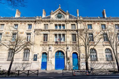 Paris, France - March 22, 2024: Exterior view of the Lycee Voltaire, a Parisian public general and technological education establishment located in the 11th arrondissement of Paris clipart