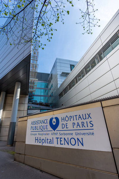 Paris, France - March 22, 2024: Sign of the Tenon hospital (Meyniel building). The Tenon Hospital (Hpital Tenon) is part of the Groupe Hospitalier Universitaire AP-HP Sorbonne Universite of Paris