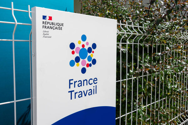 Biarritz, France - May 30, 2024: Sign and logo at the entrance to a France Travail agency. France Travail, formerly Pole Emploi, is the French administration in charge of employment