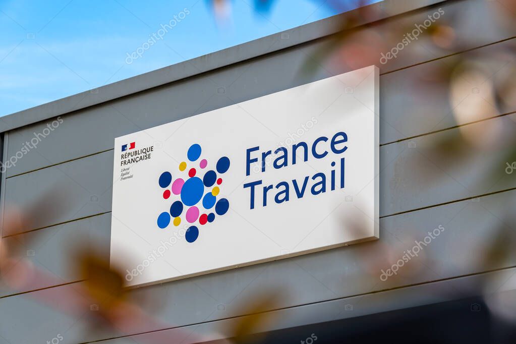 Biarritz, France - May 30, 2024: Sign and logo at the entrance to a France Travail agency. France Travail, formerly Pole Emploi, is the French administration in charge of employment