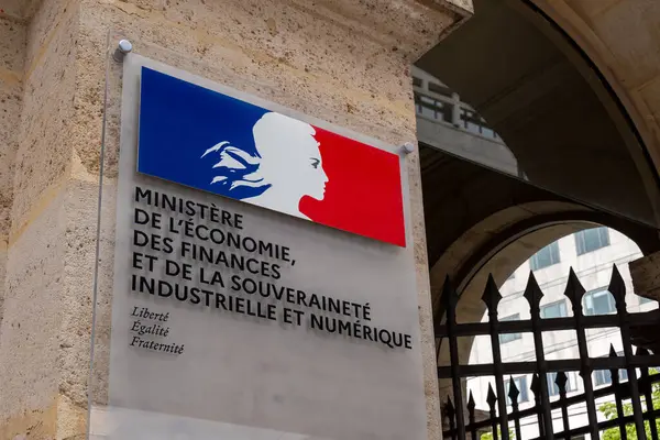 stock image Paris, France - June 2, 2024: Close-up of the sign at the entrance to the building of the Ministry of Economy, Finance and Industrial and Digital Sovereignty with the logo of the French Republic