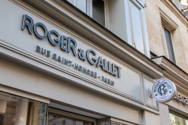 Paris, France - June 15, 2024: Sign and logo of the Roger et Gallet boutique on rue Saint-Honor in Paris. Roger et Gallet is a French house of perfumes, soaps and toiletry essentials clipart