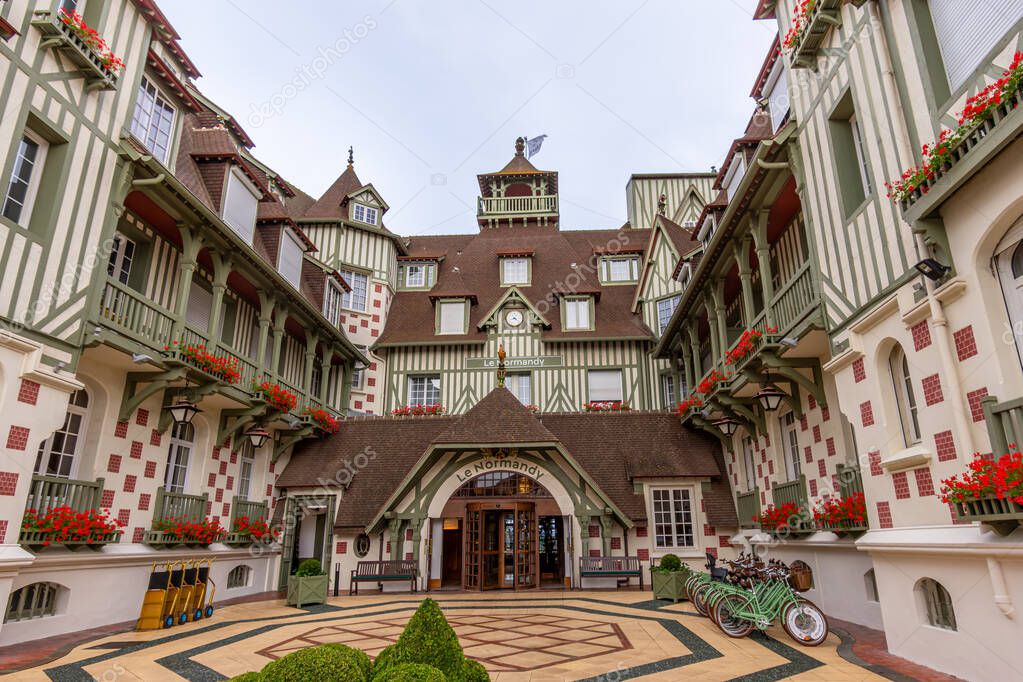Deauville, France - July 21, 2024: Entrance to the Le Normandy Barriere hotel in Deauville. The Normandy is a large palace hotel built in traditional Norman style architecture