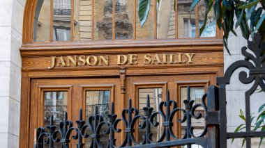 Paris, France - August 7, 2024: Sign at the entrance to the Lycee Janson de Sailly. The Lycee Janson de Sailly is a Parisian school offering middle school, high school and preparatory classes clipart