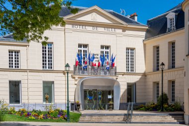 Clamart, France - August 8, 2024: Exterior view of the town hall of Clamart, a French commune located southwest of Paris, in the Hauts-de-Seine department, in the Ile-de-France region clipart