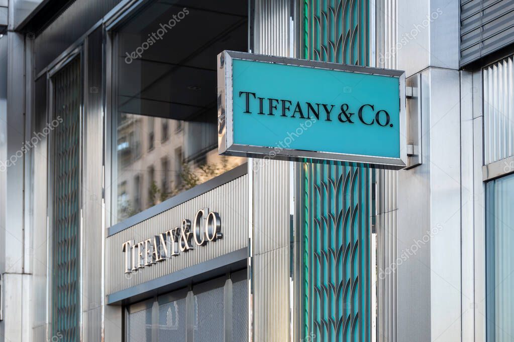 Geneva, Switzerland - November 17, 2024: Sign and logo of a Tiffany and Co store in Geneva. Tiffany is an American company specializing in jewelry, tableware and luxury
