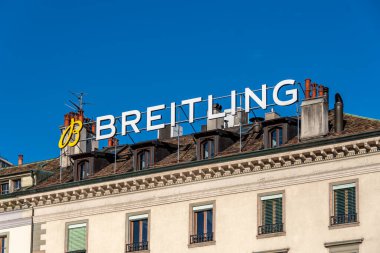 Geneva, Switzerland - November 17, 2024: Commercial sign for Breitling in Geneva. Breitling is a Swiss luxury watchmaker known for its precision-made chronometers clipart