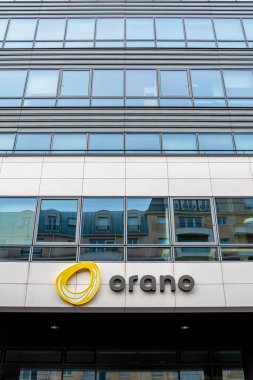 Chatillon, France - January 5, 2025: Facade of the headquarters of Orano (formerly Areva), a French multinational company specializing in nuclear fuel business clipart