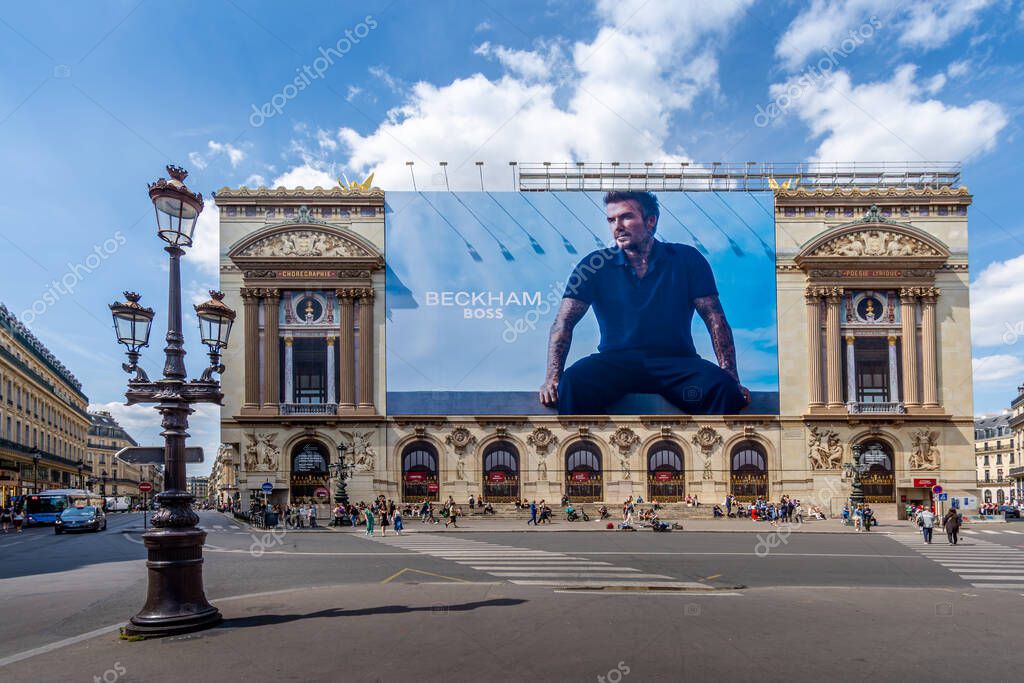 Paris, France - June 16, 2025: Advertising billboard for the Beckham - Boss clothing collection, by Hugo Boss, over the restoration works on the main facade of the Paris Opera house (Palais Garnier)