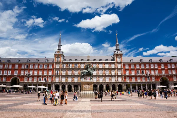 stock image Madrid, Spain - June 20, 2022: Facade of the buildings of the Major Square full of tourists, in the center of Madrid