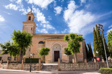 Esquivias, Spain - June 21, 2022: Facade of the Church of Our Lady of the Assumption in Esquivias where Cervantes married his wife Catalina
