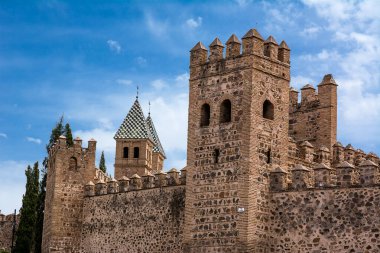 Toledo, Spain - June 21, 2022: Walls and defensive towers of Toledo