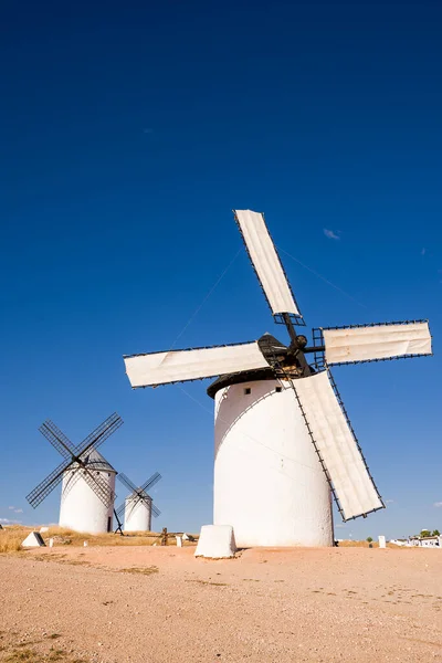 stock image Ancient windmill in Campo de Criptana (Spain) with the blades covered by a cloth ready to go into operation