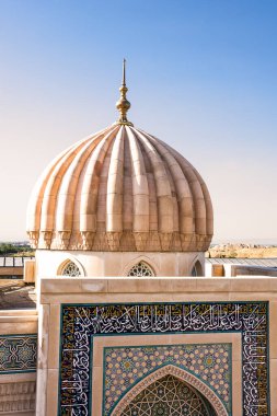 Dome and portal Hazrat Khizr Mosque in Samarkand on a sunny day clipart