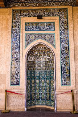 Samarkand, Uzbekistan - 06 July 2024: Niche decorated with mosaic with oriental motifs in the Hazrat Khizr Mosque clipart