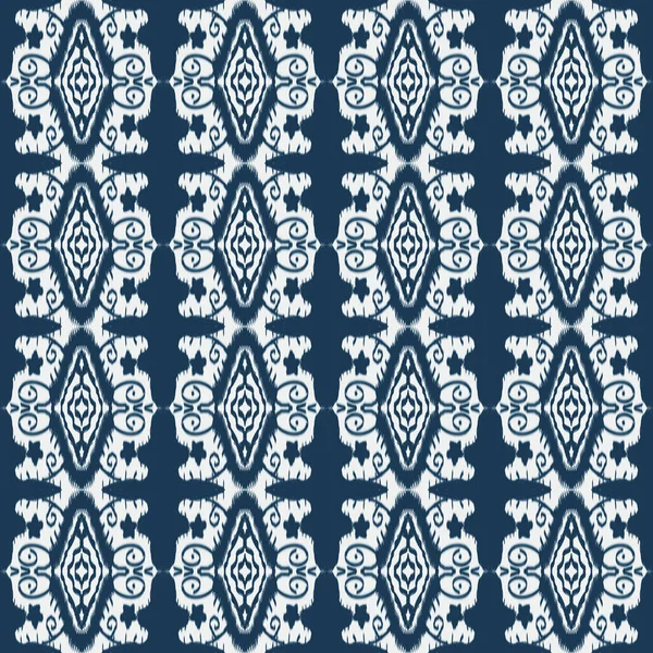 Abstract stripes Ikat paisley embroidery on blue background. Geometric ethnic oriental seamless pattern is traditional.