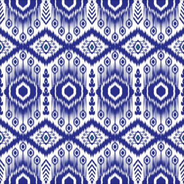 Yerli soyut Ikat Deseni. Geleneksel geometrik etnik model kusursuz. Kızılderili tarzında kabile tekrarı. Kumaş, duvar kağıdı, kumaş, tekstil, halı için motif el yapımı Ikat tasarımı.