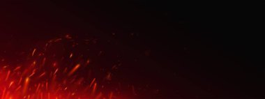 Ateş kıvılcımları ve kıvılcımlar karanlık uzayda kıvılcımlar saçıyor, kırmızı sıcak parçacıklar havada uçuşuyor, alev alev yanan alevlerle yanan soyut arka plan, şenlik ateşi ya da patlamadan saçılan alev parçaları.