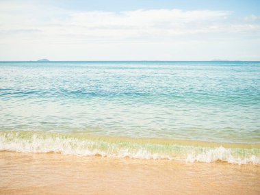White Wave Sea Summer on Sand Beach with Blue Sky Background,Water Shore Beautiful for Tourism Relax Vacation Nature Tropical Travel in Holidays,Coast at Island with Cloud Sunlight.