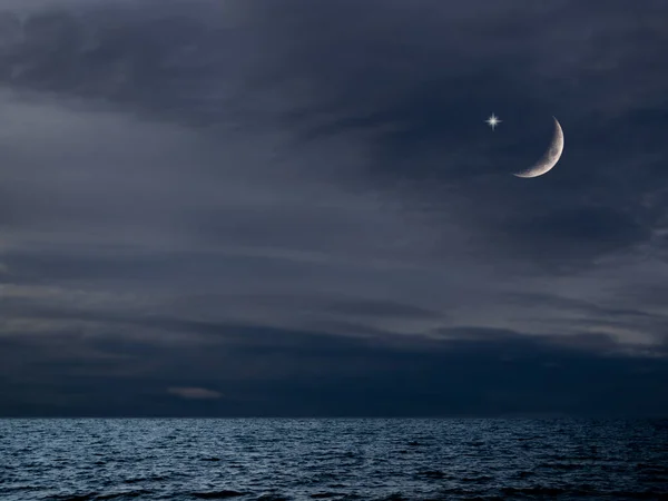 Design Ramadan background Concept,Crescent Moon with Sky in Night Blue Sea Background,Symbols Celebration Islamic Arabic Muslim Religon,New Year Muharram,Eid ai-fitr Holy Got Evening.