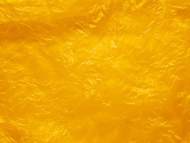 Turuncu Plastik Doku Örtüsü Sarı Arkaplan Efekti Torba Etiketi Kırışıklık Kalıbı Film Kırışıklık Moda Moda Paketi Arka plan Renk Rengi Yazı Temizleme Posteri Parlak Duvar Kağıdı Kaplaması.
