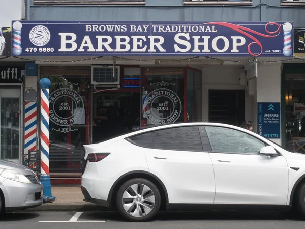 stock image  Browns Bay-New Zealand-Decenber 10 , 2022- Frontage and sign of Browns Bay Traditional Barber Shop.Landmark