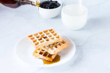 Belgian waffles for breakfast, healthy breakfast, stack of waffles