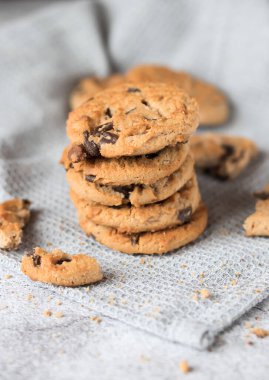 Cookies with pieces of chocolate. On a gray background