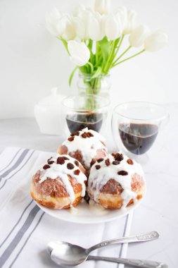 Donuts and black coffee on a white background. breakfast