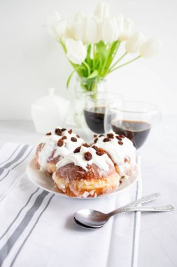 Donuts and black coffee on a white background. breakfast